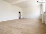 Blick zu Tür - Moderne Bürofläche in Fellbach
