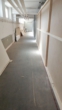 Flur Richtung Lastenaufzug - *130 m² Lagerfläche im Untergeschoss*
