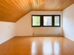 Blick in den Schlafzimmer mit Korkboden - NEU – Ruhiges Wohnen in Unterkirneck