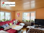 Blick in den Wohnbereich mit Balkonzugang - 3,5 Zimmer mit Balkon und Garage