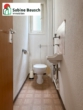 Blick in die Tageslichttoilette - Haus mit Charm & Potential in zentraler Lage