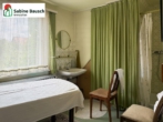 Blick in das Zimmer 1 der Maisonette - Haus mit Charm & Potential in zentraler Lage