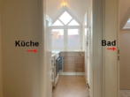 Links die Küche - Single-DG-Wohnung mitten in Bad Cannstatt